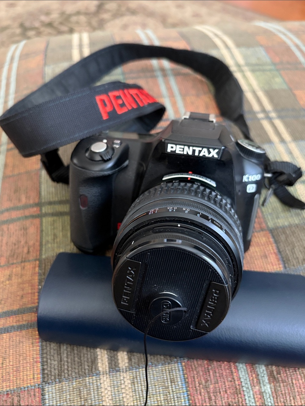 Pentax K 100 DDSLR camera plus original Pentax 18–55 mm kit lens. Tested working